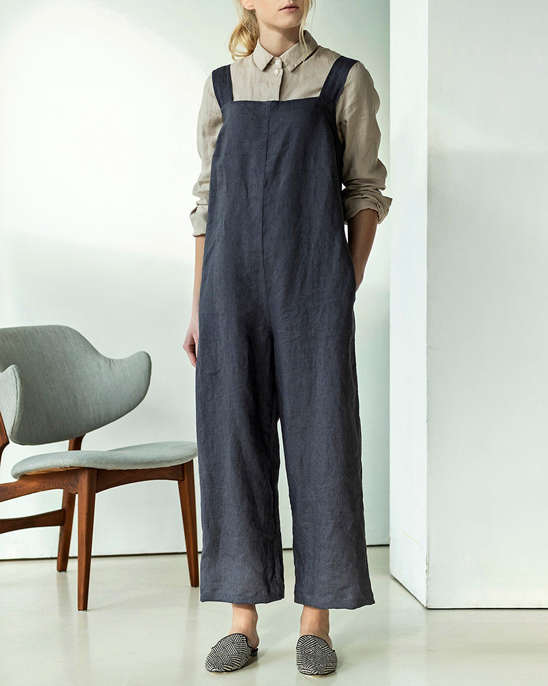 Navy bib overalls with wide legs, front seam, adjustable shoulder straps
