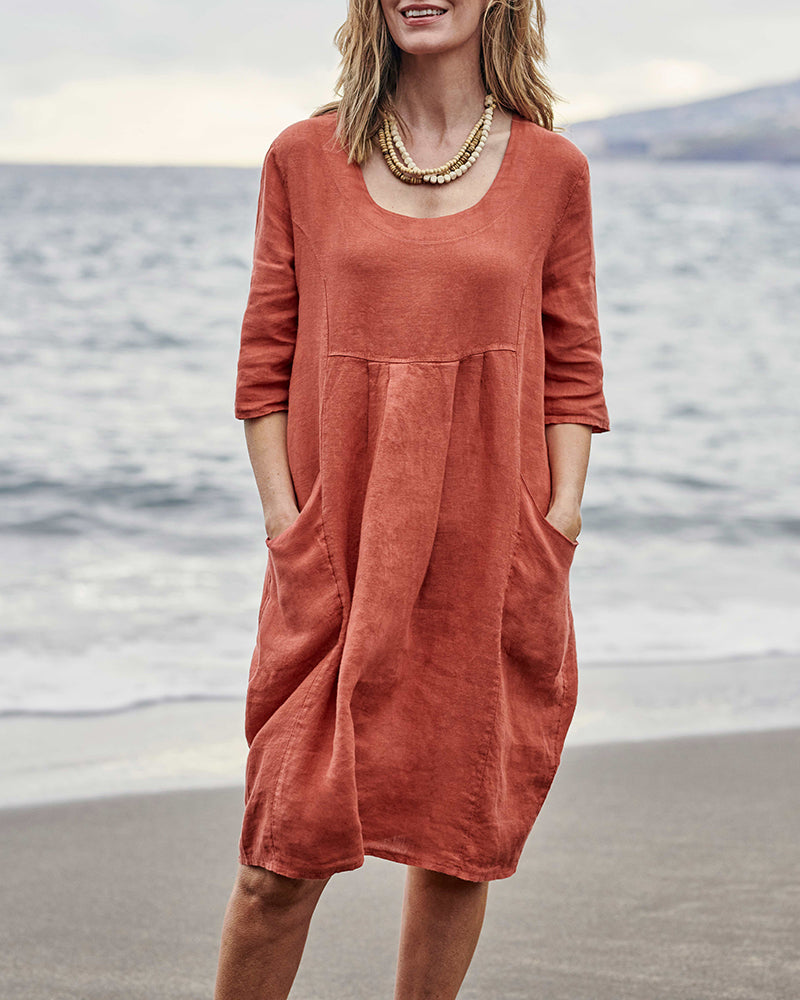 Rust red loose pocket dress with round neck, 3/4 sleeves, side pockets